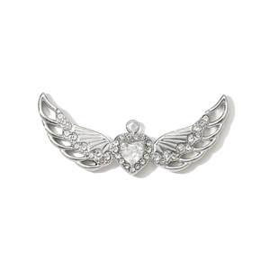Detail shot of heart pendant with wings featuring clear crystal pavé on silver finish