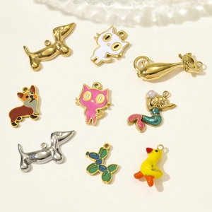 Assorted stainless steel animal charms including balloon dog, corgi and mermaid pendants