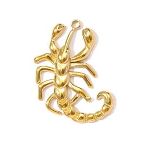 Polished gold scorpion pendant detail featuring a mirror finish and intricate joints
