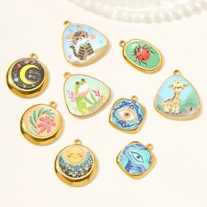 French vintage stainless steel pendants set with colorful enamel animal and sun motifs