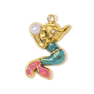 Detail of mermaid pendant with blue-green enamel tail and white pearl head in gold finish
