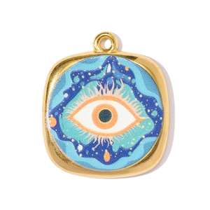 Detail of square gold evil eye pendant with cosmic blue starry sky and enamel finish