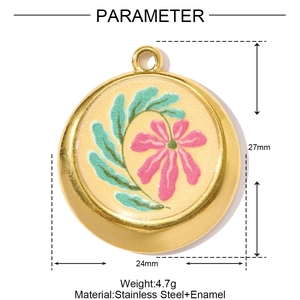 Detail of round stainless steel enamel pendant with pink floral design and 27mm size