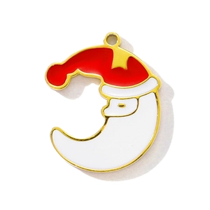 Detail eines Weihnachts-Anhängers mit Weihnachtsmann und Mondsichel aus Emaille