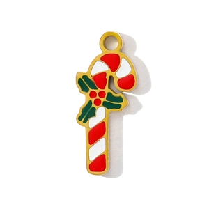 Detail von Zuckerstangen-Anhänger mit rot-weißen Streifen und Stechpalme für Schmuck