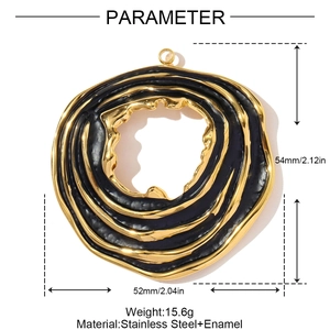 Detailed view of oversized wavy gold stainless steel pendant with black enamel inlay