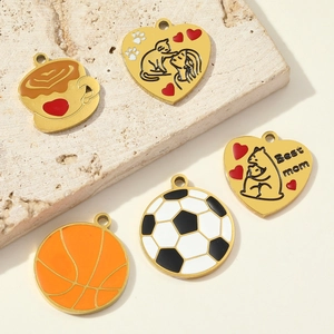 Collection of gold-plated sports and MOM heart charms including basketball and soccer motifs