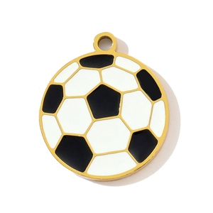 Macro shot of gold-plated soccer ball pendant with black and white enamel detail