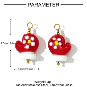Detailed view of red lampwork glass mitten pendants with stainless steel loops for DIY jewelry