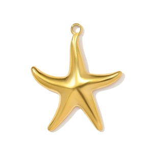 Detail of a matte gold starfish pendant with a closed ring for jewelry making