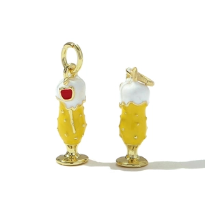 Detailed view of two beer mug charms with colorful enamel and golden hanging rings
