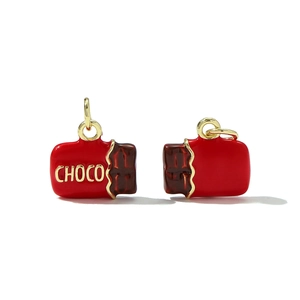 Creative chocolate-shaped pendant with red enamel finish and golden CHOCO relief detail