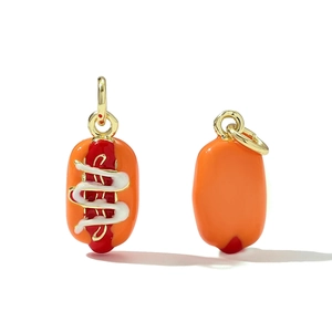 Detailed view of handmade enamel hot dog pendants with gold plating and cubic zirconia