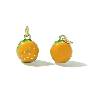 Detailed view of colorful burger-shaped enamel charms with golden metal lobster clasps
