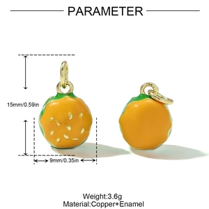 Detail view of 15mm copper burger charms with orange and green enamel finish