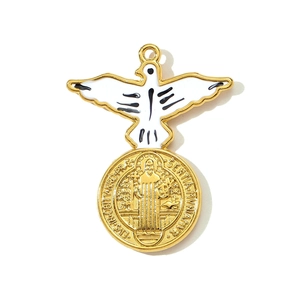 Detailed gold Saint Benedict medal pendant featuring a white enamel dove and holy symbols