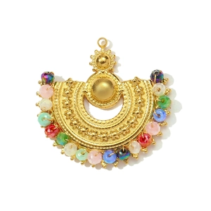 Detail of bohemian gold fan pendant with textured metal and colorful beaded fringe
