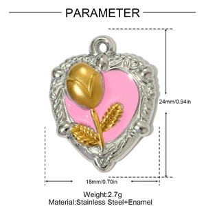 Macro view of heart-shaped stainless steel pendant with pink enamel and tulip flower