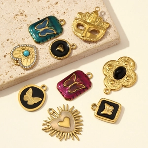Set di ciondoli vintage a farfalla e cuore in acciaio inossidabile per gioielli DIY