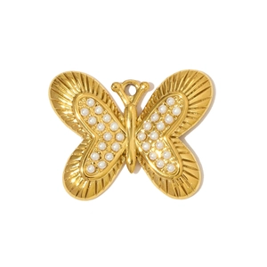 Macro view of gold butterfly pendant with white pearls and detailed radial wing textures