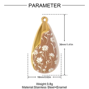 Detailed view of water drop pendant in stainless steel and enamel with floral pattern