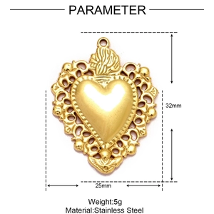 Detail of golden stainless steel sacred heart pendant with intricate relief carvings