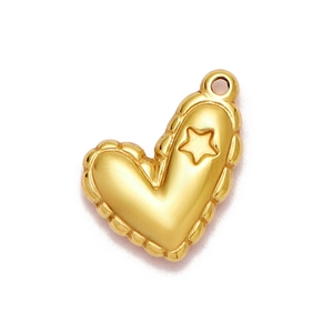 Macro shot of gold heart pendant featuring a star pattern and wavy 3D textured edges