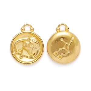 Detail view of Virgo zodiac pendant showing embossed symbol and constellation map on metal