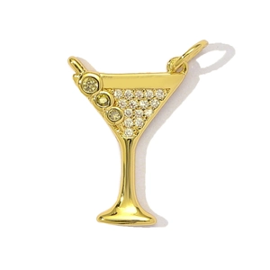 Detailed close-up of a gold cocktail glass pendant with white crystals and yellow gems