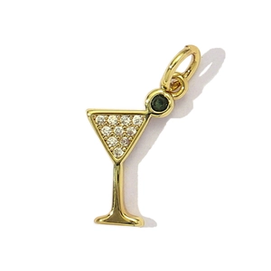 Detailed view of cocktail glass pendant with gold plating and cubic zirconia inlay
