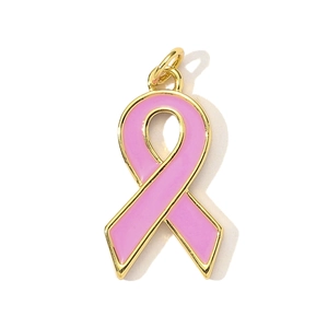 Detailed macro view of pink ribbon pendant with gold plating for DIY jewelry making