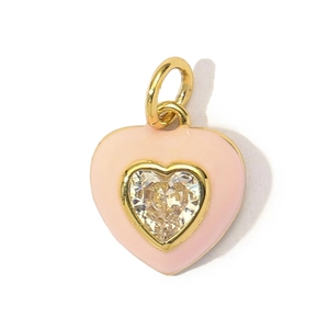 Detailed view of heart pendant with pink enamel border and centered clear cubic zirconia
