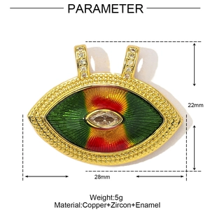 Detail view of eye shaped gold pendant with colorful enamel and zircon crystals