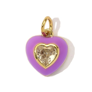 Detailed view of a gold heart pendant with purple enamel and a center-set cubic zirconia