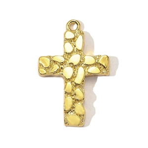 Detailed view of golden cross pendant with vintage textured finish and raised oval accents