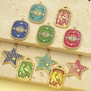 Colorful French enamel evil eye and star pendants in stainless steel with rhinestones