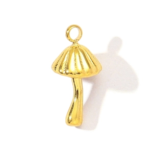 Close-up of golden mushroom pendant with ribbed cap texture and steel ring connector