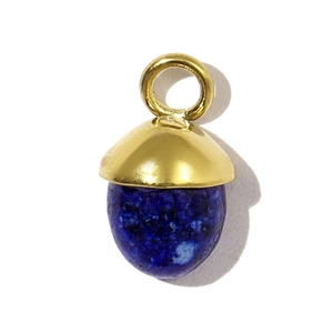 Detail of acorn pendant with polished gold metal top and blue natural stone base