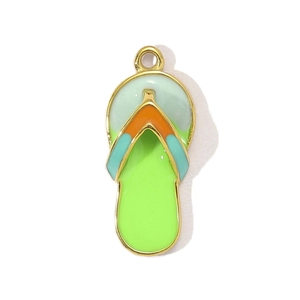 Detailed macro view of a colorful enamel flip-flop pendant in gold-plated stainless steel