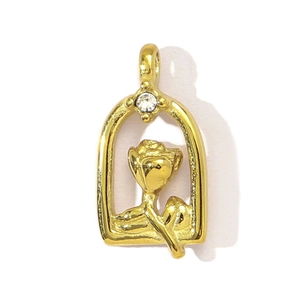 Macro detail of golden rose pendant with floral frame and sparkling zircon stone