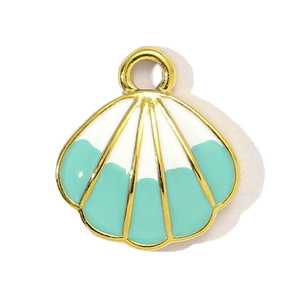 Detailed view of a gold-plated seashell pendant with teal and white enamel for DIY jewelry