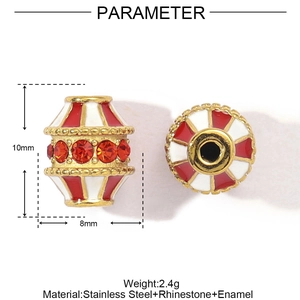 Detail view of a circus-style red and white striped bead with rhinestones and enamel