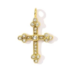Detailed view of vintage steel cross pendant with crystal rhinestones on white background