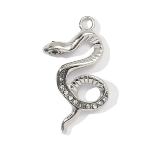 Vintage silver snake pendant with a green gemstone eye and white zircon detailing