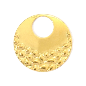 Detail of French vintage hammered texture gold circle pendant in stainless steel