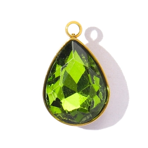 Detailed view of faceted green teardrop crystal pendant with gold stainless steel frame