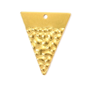 Detailed macro view of vintage hammered gold triangle pendant with pebble texture
