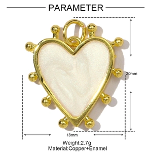 Detailed view of white enamel heart pendant size 20mm with gold copper frame