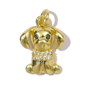 Detailed view of a gold-plated dog pendant featuring a sparkling cubic zirconia collar