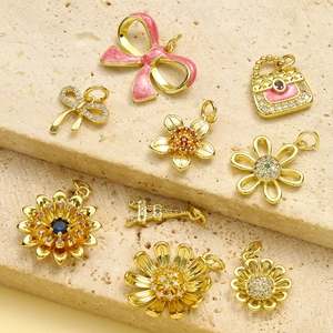 Golden flower and bow pendant collection with zircons for DIY jewelry making
